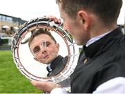 22 May 2022; Winning jockey Chris Hayes celebrates with the shield after riding Homeless Songs to win the Tattersalls Irish 1,000 Guineas during the Tattersalls Irish Guineas Festival at The Curragh Racecourse in Kildare. Photo by Harry Murphy/Sportsfile