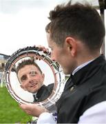 22 May 2022; Winning jockey Chris Hayes celebrates with the shield after riding Homeless Songs to win the Tattersalls Irish 1,000 Guineas during the Tattersalls Irish Guineas Festival at The Curragh Racecourse in Kildare. Photo by Harry Murphy/Sportsfile