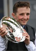 22 May 2022; Winning jockey Chris Hayes celebrates with the shield after riding Homeless Songs to win the Tattersalls Irish 1,000 Guineas during the Tattersalls Irish Guineas Festival at The Curragh Racecourse in Kildare. Photo by Harry Murphy/Sportsfile