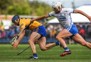 22 May 2022; David McInerney of Clare is tackled by Neil Montgomery of Waterford during the Munster GAA Hurling Senior Championship Round 5 match between Clare and Waterford at Cusack Park in Ennis, Clare. Photo by Ray McManus/Sportsfile
