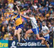 22 May 2022; David Fitzgerald of Clare is tackled by Pauric Mahony of Waterford during the Munster GAA Hurling Senior Championship Round 5 match between Clare and Waterford at Cusack Park in Ennis, Clare. Photo by Ray McManus/Sportsfile