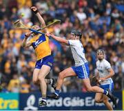 22 May 2022; David Fitzgerald of Clare is tackled by Pauric Mahony of Waterford during the Munster GAA Hurling Senior Championship Round 5 match between Clare and Waterford at Cusack Park in Ennis, Clare. Photo by Ray McManus/Sportsfile