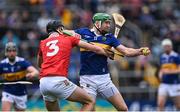 22 May 2022; Noel McGrath of Tipperary in action against Robert Downey of Cork during the Munster GAA Hurling Senior Championship Round 5 match between Tipperary and Cork at FBD Semple Stadium in Thurles, Tipperary. Photo by Piaras Ó Mídheach/Sportsfile