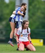 22 May 2022; Niamh McGrath, right, and Ruby Browne of Waterford celebrate as Keeva Owens of Tyrone falls to her knees at the final whistle of the 2022 All-Ireland U14 Silver Final between Tyrone and Waterford at the GAA National Games Development Centre in Abbotstown, Dublin. Photo by Ben McShane/Sportsfile