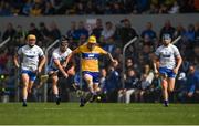 22 May 2022; Aaron Fitzgerald of Clare is tackled by Patrick Curran of Waterford , supported by Peter Hogan and Kieran Bennett during the Munster GAA Hurling Senior Championship Round 5 match between Clare and Waterford at Cusack Park in Ennis, Clare. Photo by Ray McManus/Sportsfile