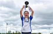 22 May 2022; Waterford captain Ruby Browne lifts the cup after the 2022 All-Ireland U14 Silver Final between Tyrone and Waterford at the GAA National Games Development Centre in Abbotstown, Dublin. Photo by Ben McShane/Sportsfile