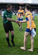 22 May 2022; Referee Paud O'Dwyer shakes hands with Clare corner back Rory Hayes after the Munster GAA Hurling Senior Championship Round 5 match between Clare and Waterford at Cusack Park in Ennis, Clare. Photo by Ray McManus/Sportsfile