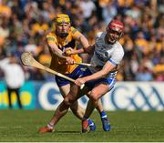 22 May 2022; Calum Lyons of Waterford is tackled by Darragh Lohan of Clare during the Munster GAA Hurling Senior Championship Round 5 match between Clare and Waterford at Cusack Park in Ennis, Clare. Photo by Ray McManus/Sportsfile