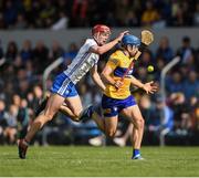 22 May 2022; Shane O'Donnell of Clare is tackled by Calum Lyons of Waterford during the Munster GAA Hurling Senior Championship Round 5 match between Clare and Waterford at Cusack Park in Ennis, Clare. Photo by Ray McManus/Sportsfile