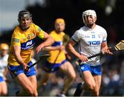 22 May 2022; Cathal Malone of Clare in action against Michéal Harney of Waterford during the Munster GAA Hurling Senior Championship Round 5 match between Clare and Waterford at Cusack Park in Ennis, Clare. Photo by Ray McManus/Sportsfile