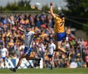 22 May 2022; David McInerney of Clare wins possession ahead of Patrick Curran of Waterford during the Munster GAA Hurling Senior Championship Round 5 match between Clare and Waterford at Cusack Park in Ennis, Clare. Photo by Ray McManus/Sportsfile