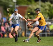 22 May 2022; Cathal Malone of Clare in action against Kieran Bennett of Waterford during the Munster GAA Hurling Senior Championship Round 5 match between Clare and Waterford at Cusack Park in Ennis, Clare. Photo by Ray McManus/Sportsfile