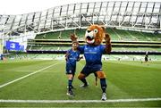 21 May 2022; Leinster mascot Alex Traynor with Leo the Lion before the United Rugby Championship match between Leinster and Munster at the Aviva Stadium in Dublin. Photo by Harry Murphy/Sportsfile