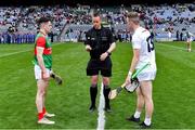 21 May 2022; Referee Michael Kennedy performs the coin toss alongside team captains Shane Boland of Mayo and Brian Byrne of Kildare before the Christy Ring Cup Final match between Kildare and Mayo at Croke Park in Dublin. Photo by Piaras Ó Mídheach/Sportsfile