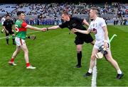 21 May 2022; Referee Michael Kennedy alongside team captains Shane Boland of Mayo and Brian Byrne of Kildare before the Christy Ring Cup Final match between Kildare and Mayo at Croke Park in Dublin. Photo by Piaras Ó Mídheach/Sportsfile