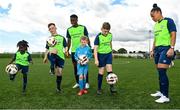 23 May 2022; Chiedozie Ogbene and Rianna Jarrett with Marwa Babiker, Jason Burnett, Will Hawkins, and Eoin Hawkins during the launch of the INTERSPORT Elverys FAI Summer Soccer Schools at the FAI Headquarters in Abbotstown, Dublin. Photo by Harry Murphy/Sportsfile