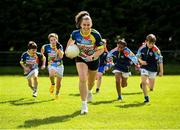 23 May 2022; Meath footballer Emma Duggan with Skyrne GFC underage stars at the launch of the Kellogg’s GAA Cúl Camps on-pack competition. Follow in the footsteps of Skryne GFC and your GAA club could win up to €25,000 in the Kellogg’s GAA Cúl Camps on-pack competition. To nominate your GAA club today, all that is required is to purchase a promotional box of Kellogg’s Corn Flakes, Rice Krispies or Bran Flakes. Using a unique on pack code, log on to kelloggsculcamps.gaa.ie/competition and nominate your club of choice. Photo by Stephen McCarthy/Sportsfile