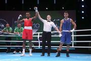 23 May 2022; Gabriel Dossen of Ireland is declared the winner over Miguel Cuadrado Entrena of Spain after their Middleweight 71-75kg Round of 32 bout during the EUBC Elite Men's European Boxing Championships Preliminary Rounds at Karen Demirchyan Sports and Concerts Complex in Yerevan, Armenia. Photo by Hrach Khachatryan/Sportsfile