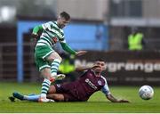 23 May 2022; Jack Byrne of Shamrock Rovers in action against Luke Heeney of Drogheda United during the SSE Airtricity League Premier Division match between Drogheda United and Shamrock Rovers at Head in the Game Park in Drogheda, Louth. Photo by Ben McShane/Sportsfile