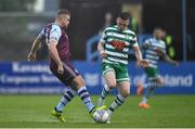 23 May 2022; Georgie Poynton of Drogheda United in action against Andy Lyons of Shamrock Rovers during the SSE Airtricity League Premier Division match between Drogheda United and Shamrock Rovers at Head in the Game Park in Drogheda, Louth. Photo by Ben McShane/Sportsfile