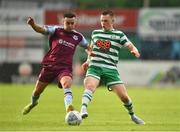 23 May 2022; Andy Lyons of Shamrock Rovers in action against Dylan Grimes of Drogheda United during the SSE Airtricity League Premier Division match between Drogheda United and Shamrock Rovers at Head in the Game Park in Drogheda, Louth. Photo by Ben McShane/Sportsfile