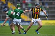 22 May 2022; Billy Drennan of Kilkenny gets away from Limerick players Chris Thomas, left, and Evan O'Leary during the oneills.com GAA Hurling All-Ireland U20 Championship Final match between Kilkenny and Limerick at FBD Semple Stadium in Thurles, Tipperary. Photo by Piaras Ó Mídheach/Sportsfile