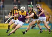 21 May 2022; Rory O'Connor of Wexford is tackled by Martin Keoghan of Kilkenny during the Leinster GAA Hurling Senior Championship Round 5 match between Kilkenny and Wexford at UPMC Nowlan Park in Kilkenny. Photo by Stephen McCarthy/Sportsfile