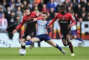 23 May 2022; Jason McClelland of St Patrick's Athletic in action against Ali Coote, left, and Junior Ogedi-Uzokwe of Bohemians during the SSE Airtricity League Premier Division match between St Patrick's Athletic and Bohemians at Richmond Park in Dublin. Photo by Piaras Ó Mídheach/Sportsfile