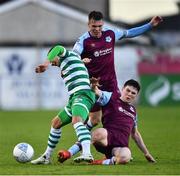 23 May 2022; Graham Burke of Shamrock Rovers is tackled by James Clarke of Drogheda United during the SSE Airtricity League Premier Division match between Drogheda United and Shamrock Rovers at Head in the Game Park in Drogheda, Louth. Photo by Ben McShane/Sportsfile