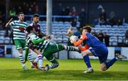 23 May 2022; Danny Mandroiu of Shamrock Rovers tackles Drogheda United goalkeeper Sam Long, resulting in a red card, during the SSE Airtricity League Premier Division match between Drogheda United and Shamrock Rovers at Head in the Game Park in Drogheda, Louth. Photo by Ben McShane/Sportsfile