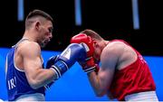 24 May 2022; Luke Maguire of Ireland, left, in action against Daniel Wieslaw Piotrowski of Poland in their light middleweight round of 32 bout during the EUBC Elite Men's European Boxing Championships Preliminary Rounds at Karen Demirchyan Sports and Concerts Complex in Yerevan, Armenia. Photo by Hrach Khachatryan/Sportsfile