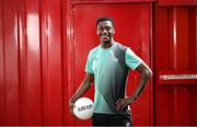 24 May 2022; St Patrick's Athletic player James Abankwah poses for a portrait at the Football for Unity festival launch at Richmond Park in Dublin. The six weeks long festival, organised by SARI and Dublin NEIC, will once again showcase the potential of football as an educational tool which can bring communities together and promote social inclusion for newcomers to Ireland. Photo by Ramsey Cardy/Sportsfile