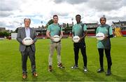 24 May 2022; In attendance at the Football for Unity festival launch at Richmond Park in Dublin, are, from left, Former Republic of Ireland manager Brian Kerr, NEIC Community Sport & Wellness co-ordinator and former Dublin football Michael Darragh Macauley, St Patrick's Athletic player James Abankwah and Suad Mooge, SARI Youth Leader. The six weeks long festival, organised by SARI and Dublin NEIC, will once again showcase the potential of football as an educational tool which can bring communities together and promote social inclusion for newcomers to Ireland. Photo by Ramsey Cardy/Sportsfile