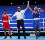 24 May 2022; Dylan Eagleson of Ireland is declared winner over Muhammet Sacli of Turkey after their bantamweight round of 16 bout during the EUBC Elite Men's European Boxing Championships Preliminary Rounds at Karen Demirchyan Sports and Concerts Complex in Yerevan, Armenia. Photo by Hrach Khachatryan/Sportsfile