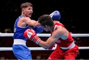 24 May 2022; Dylan Eagleson of Ireland, left, in action against Muhammet Sacli of Turkey after their bantamweight round of 16 bout during the EUBC Elite Men's European Boxing Championships Preliminary Rounds at Karen Demirchyan Sports and Concerts Complex in Yerevan, Armenia. Photo by Hrach Khachatryan/Sportsfile
