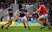 22 May 2022; Dan McCormack of Tipperary in action against Robert Downey of Cork during the Munster GAA Hurling Senior Championship Round 5 match between Tipperary and Cork at FBD Semple Stadium in Thurles, Tipperary. Photo by Piaras Ó Mídheach/Sportsfile