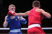 24 May 2022; Brandon McCarthy of Ireland, left, in action against Joseph Tyers of England in their lightweight round of 32 bout during the EUBC Elite Men's European Boxing Championships Preliminary Rounds at Karen Demirchyan Sports and Concerts Complex in Yerevan, Armenia. Photo by Hrach Khachatryan/Sportsfile