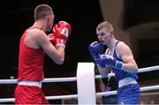 24 May 2022; Brandon McCarthy of Ireland, right, in action against Joseph Tyers of England in their lightweight round of 32 bout during the EUBC Elite Men's European Boxing Championships Preliminary Rounds at Karen Demirchyan Sports and Concerts Complex in Yerevan, Armenia. Photo by Hrach Khachatryan/Sportsfile