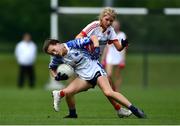 22 May 2022; Emma Power of Waterford and Caoimhe Corrigan of Tyrone during the 2022 All-Ireland U14 Silver Final between Tyrone and Waterford at the GAA National Games Development Centre in Abbotstown, Dublin. Photo by Ben McShane/Sportsfile