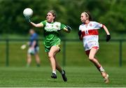 22 May 2022; Ava Dunne of Offaly and Áine Young of Derry during the 2022 All-Ireland U14 Bronze Final between Derry and Offaly at the GAA National Games Development Centre in Abbotstown, Dublin. Photo by Ben McShane/Sportsfile