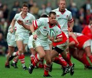 3 October 1998; Andrew Matchett of Ulster is tackled by Eddie Halvey of Munster during the Guinness Interprovincial Championship match between Munster and Ulster at Musgrave Park in Cork. Photo by Matt Browne/Sportsfile
