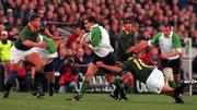 28 November 1998; Andy Ward of Ireland in action against Henry Honiball of South Africa during a International Friendly Match between Ireland and South Africa at Landsdowne Road in Dublin. Photo by Brendan Moran/Sportsfile