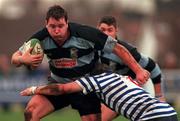 19 December 1998: Anthony Foley of Shannon is tackled by Ron Somers of Blackrock College during the AIB All- Ireland League Division 1 match between Blackrock and Shannon at Stradbrook Road in Dublin. Photo by Matt Browne/Sportsfile