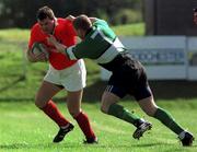 12 September 1998: Anthony Foley of Munster is tackled by Shane McEntee of Connacht during the Guinness Interprovincial Rugby Championship match between Munster and Connacht at Dooradoyle in Limerick. Photo by Matt Browne/Sportsfile