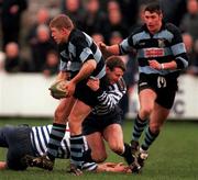19 December 1998: Colm McMahon of Shannon is tackled by Alan McGowan of Blackrock College during the AIB All- Ireland League Division 1 match between Blackrock and Shannon at Stradbrook Road in Dublin. Photo by Matt Browne/Sportsfile