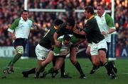 28 November 1998; Conor O'Shea of Ireland in action against Johan Erasmus of South Africa during a International Friendly Match between Ireland and South Africa at Landsdowne Road in Dublin. Photo by Brendan Moran/Sportsfile