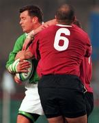 19 November 1998: Dion O'Cuinneagain of Ireland is tackled by Achiko Kobakhidze of Georgia during the International rugby match between Ireland and Georgia at Lansdowne Road in Dublin. Photo by Matt Browne/Sportsfile