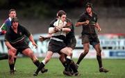 9 January 1999: Donal Martin of Old Belvedere is tackled by Mark Cunningham of De la Salle Palmerstown during the  AIB All Ireland League Division 2 match between Old Belvedere and De la Salle Palmerstown at Anglesa Road in Dublin. Photo by Ray McManus/Sportsfile