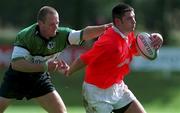 12 September 1998: Eddie Haley of Munster is tackled by Mervyn Murphy of Connacht during the Guinness Interprovincial Rugby Championship match between Munster and Connacht at Dooradoyle in Limerick. Photo by Matt Browne/Sportsfile