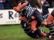 19 December 1998: Eddie Robinson of Blackrock College is stopped on his way to the try line by Rhys Ellison of Shannon during the AIB All- Ireland League Division 1 match between Blackrock and Shannon at Stradbrook Road in Dublin. Photo by Matt Browne/Sportsfile